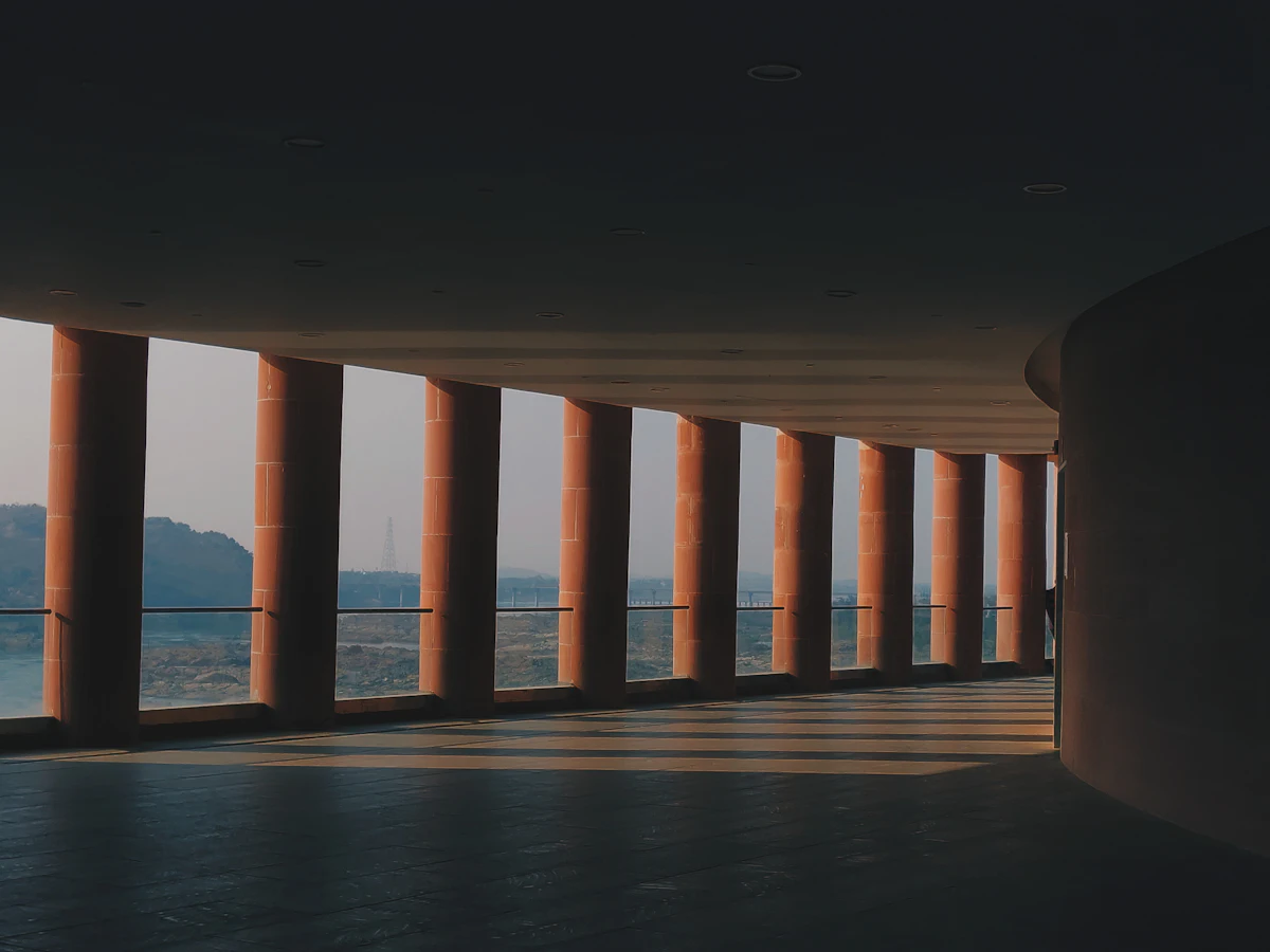 Row of concrete columns supporting an overhead deck