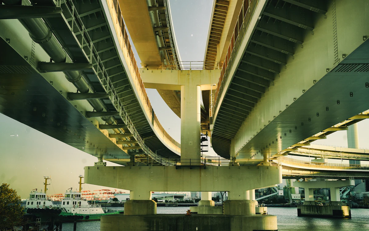 Underside of an elevated guideway showing the supporting columns